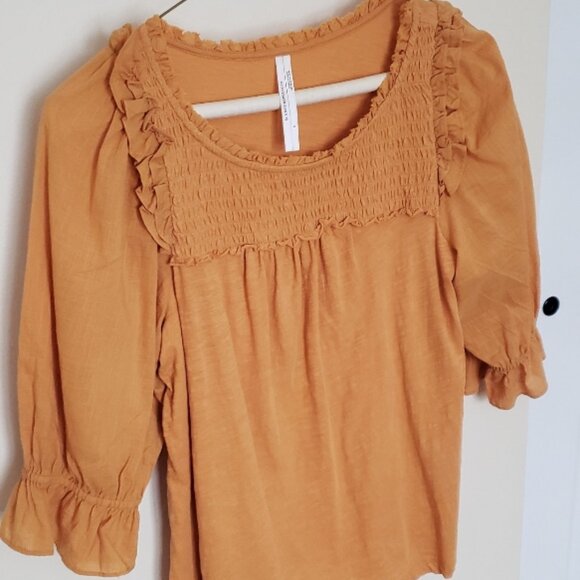 LIKE NEW rusty orange Anthropologie smocked and ruffled top, elbow length sleeve - Picture 1 of 5